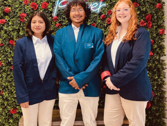 Jasmine Quintana, Filimon Aleman and Rylee Moore representing the institution of AC on behalf of the Blue Blazers.